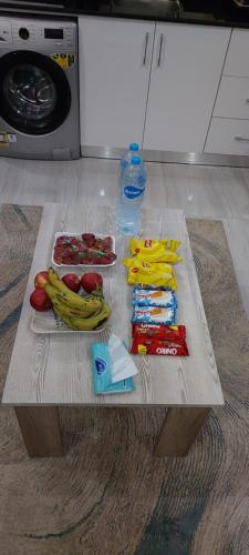 a table with fruits and vegetables on it in a kitchen at Hurghada Mirage Bay Hotel & Aquapark in Hurghada