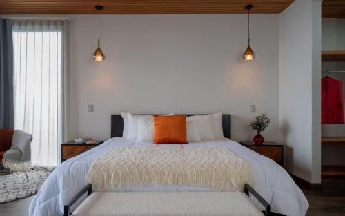 Ένα ή περισσότερα κρεβάτια σε δωμάτιο στο ÉWA Homes Monteverde