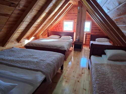 Postel nebo postele na pokoji v ubytování Apartmani Prisoje