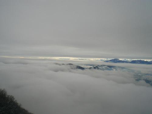 a view of clouds and mountains in the sky at B&B Il Balcone sul Lago in Brunate