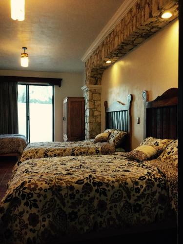 Postel nebo postele na pokoji v ubytování Hotel Mariazel