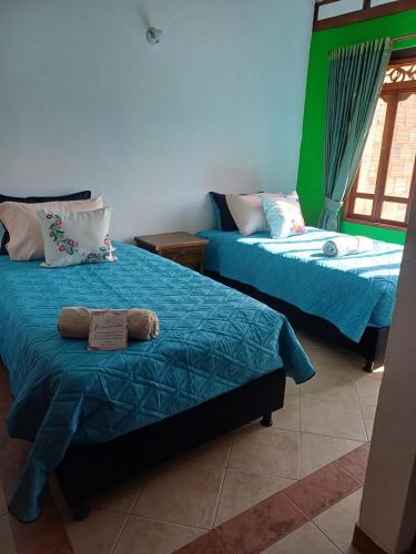 Mar y Luz Casita Hotelにあるベッド