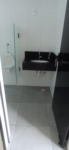 Koupelna v ubytování Chacara Itapirinha