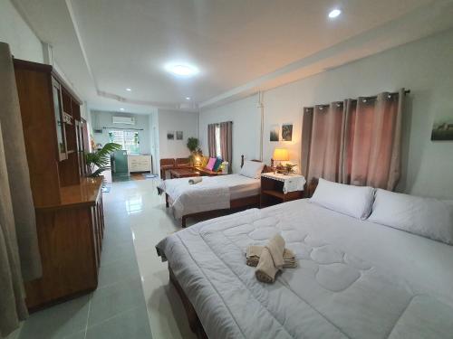 Katil atau katil-katil dalam bilik di Granny's home บ้านคุณย่า