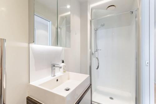 A bathroom at Sky Tower View 2BR Apt w Gym & Pool Access