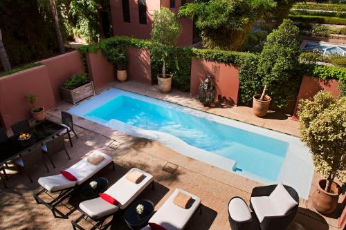 Photo de la galerie de l'établissement Hôtel & Ryads Barrière Le Naoura, à Marrakech