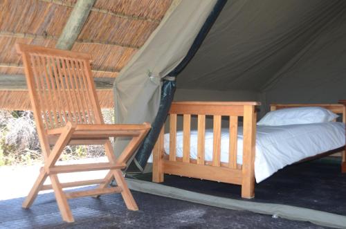 Ένα ή περισσότερα κρεβάτια σε δωμάτιο στο West Coast Luxury Tents