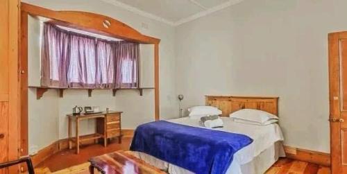 Voodi või voodid majutusasutuse Wampex Guest House In Port Elizabeth R400 Night toas