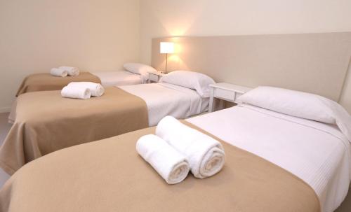 Postel nebo postele na pokoji v ubytování Hotel Acqua