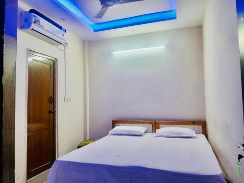 Ένα ή περισσότερα κρεβάτια σε δωμάτιο στο Lexus Lodge