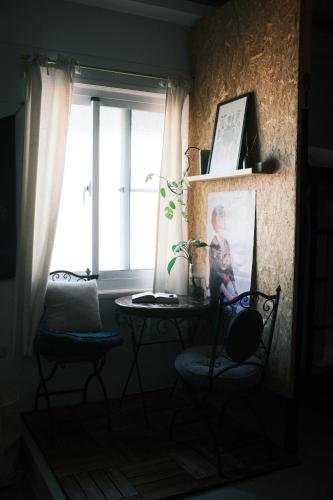 TV a/nebo společenská místnost v ubytování A Forest Homestay