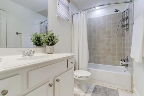 a bathroom with a sink and a toilet and a shower at Luxury Home Minutes to Downtown Close to Everything Nice in Houston