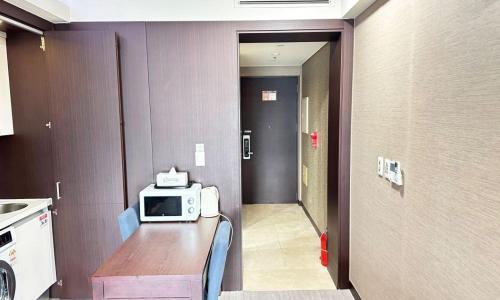 Kuchyň nebo kuchyňský kout v ubytování Centum City Hotel