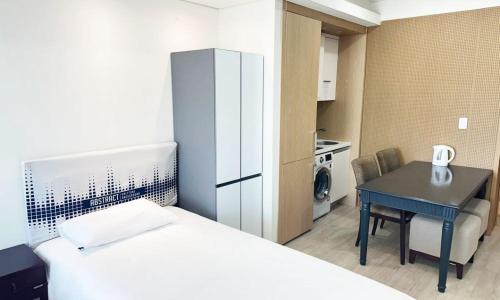 Kuchyň nebo kuchyňský kout v ubytování Centum City Hotel