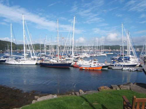 a bunch of boats are docked in a harbor at Lagganbeg Guest House in Oban