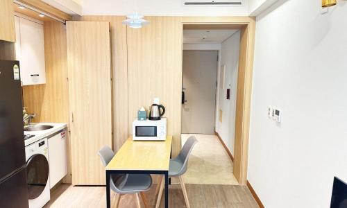 Kuchyň nebo kuchyňský kout v ubytování Centum City Hotel