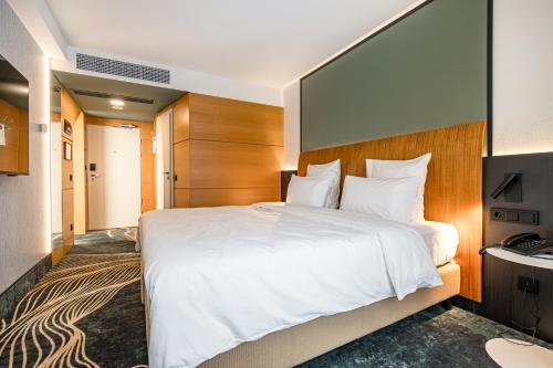 Cama o camas de una habitación en Mercure Palanga Vanagupe Resort & SPA