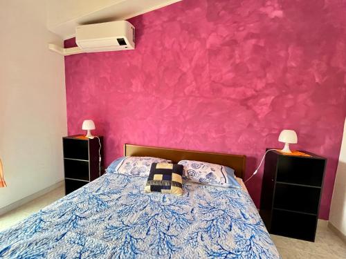 Ένα ή περισσότερα κρεβάτια σε δωμάτιο στο Casa Claudia