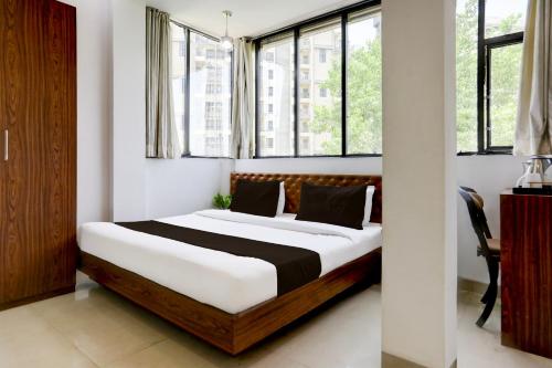Katil atau katil-katil dalam bilik di Super Hotel O MP Nagar Near Rachna Tower