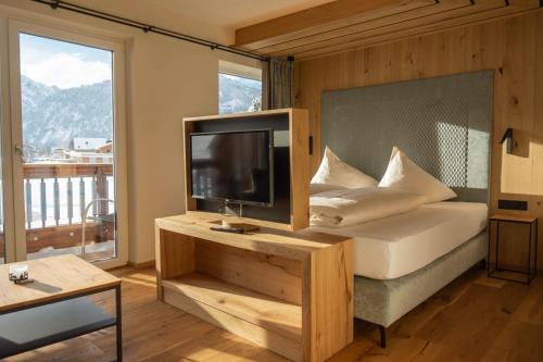 Postel nebo postele na pokoji v ubytování Hotel Lumberger Hof