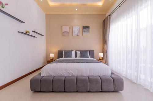 Ένα ή περισσότερα κρεβάτια σε δωμάτιο στο Villa Phoenix Brand New 1BR in Umalas, Bali