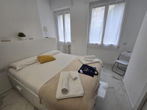 A bed or beds in a room at Appartamenti Reali Bonaccini