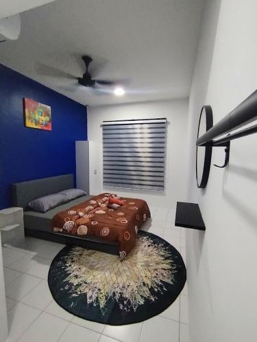 Postel nebo postele na pokoji v ubytování MyPutra Homestay Parit Buntar