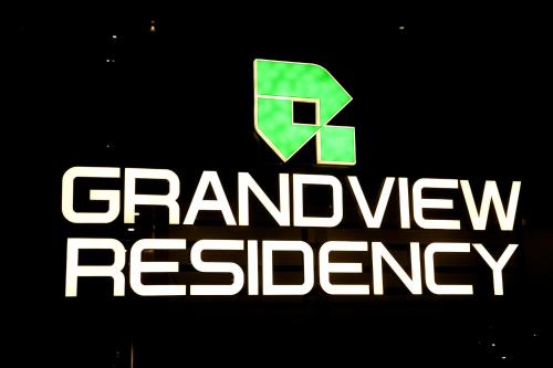 a green and white sign with the words grandview receiver at Grand View Residency in Nīleshwar