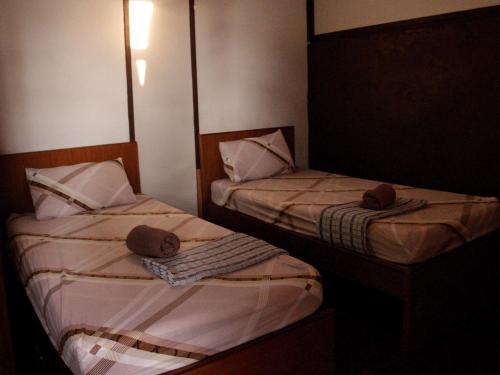 Cama o camas de una habitación en ABC Chalet Tioman
