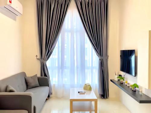 TV a/nebo společenská místnost v ubytování Anderson Residences Ipoh