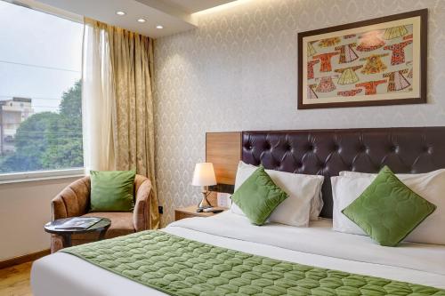 Postel nebo postele na pokoji v ubytování Hotel 91 Huda City Centre