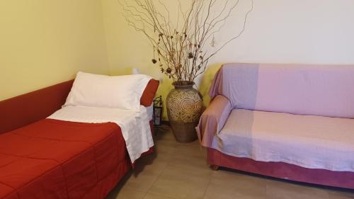 Ruang duduk di Appartamento B&B La Meta