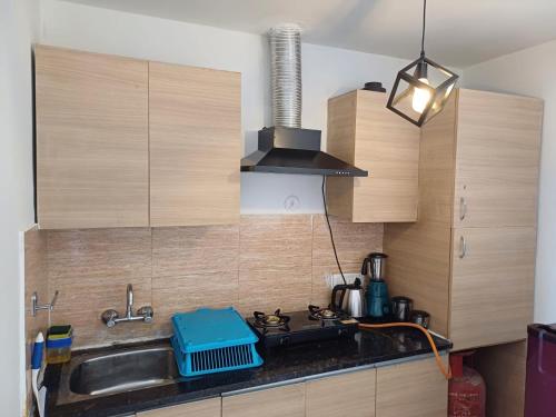 Køkken eller tekøkken på Haridasa-- Devotee of Shri Krishna