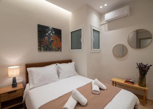Vibrant Pagrati 2-BD Retreat with Elegant-Modern style