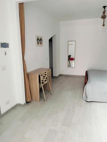 Ένα ή περισσότερα κρεβάτια σε δωμάτιο στο NAHAR HOME