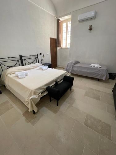 Ένα ή περισσότερα κρεβάτια σε δωμάτιο στο Casa Michela