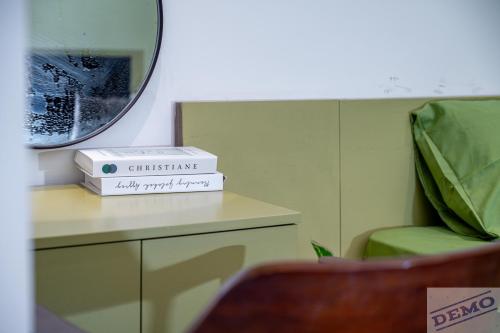 a couple of boxes sitting on a table in a room at Luxe Paradise Residence 273 Ton Duc Thang in Hanoi