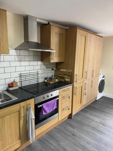 Kuchyň nebo kuchyňský kout v ubytování City Centre Apartment
