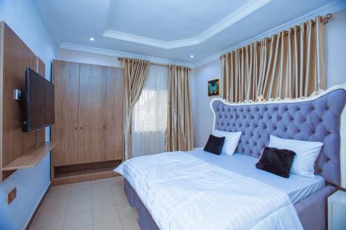 Postel nebo postele na pokoji v ubytování Two bedroom Global Premium Apartment