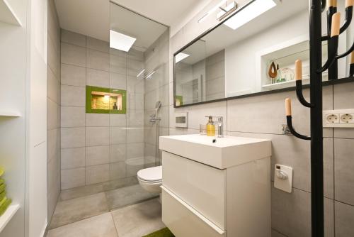 Et badeværelse på Apartma Medoši