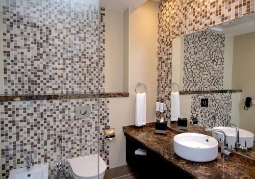 Koupelna v ubytování Jannah Executive Hotel Apartments