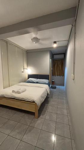 Katil atau katil-katil dalam bilik di 5 Minutes Lodge