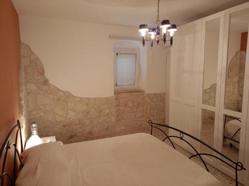 Ένα ή περισσότερα κρεβάτια σε δωμάτιο στο Svegliati, Sei in Paradiso
