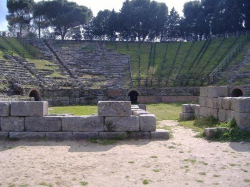 an amphitheater with a bunch of stone ruins at Mare Blu in Gioiosa Marea