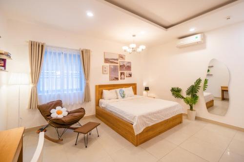 Ένα ή περισσότερα κρεβάτια σε δωμάτιο στο Homey Apartment