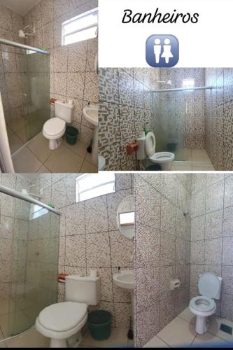 a bathroom with a toilet and two sinks and a shower at Casa de Praia - temporada in Valença