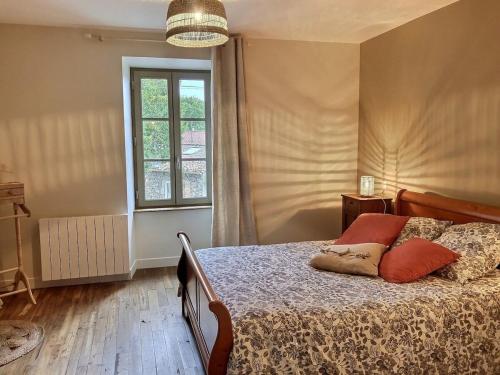 Posteľ alebo postele v izbe v ubytovaní Maison l'or du temps, gîte les Glycines