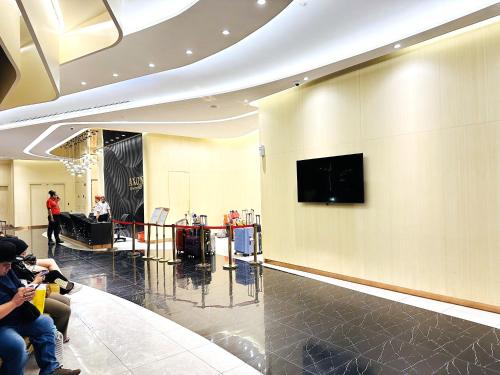 AXON Suites by Pavilion Forestにあるテレビまたはエンターテインメントセンター