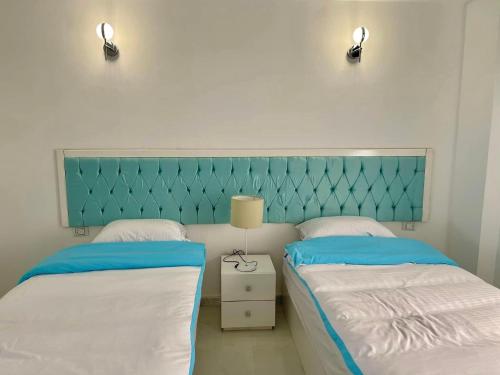 Postel nebo postele na pokoji v ubytování ايارنوب - iaru nub