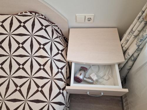 Postel nebo postele na pokoji v ubytování Girulių apartamentai prie jūros